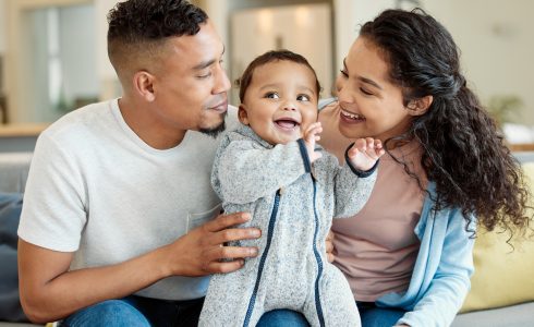 Shot of a young family bonding with their baby boy at home Home Security 101: How to Protect Your Home