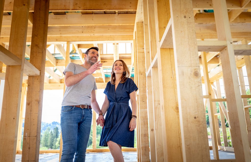 home buyers walking new construction build
